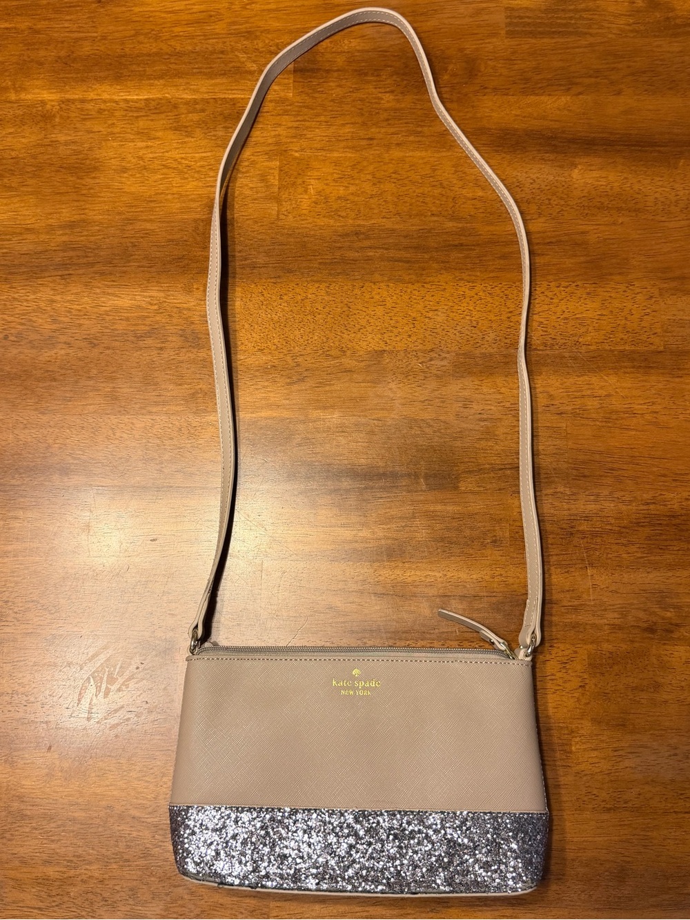 kate spade taupe crossbody with silver glitter base